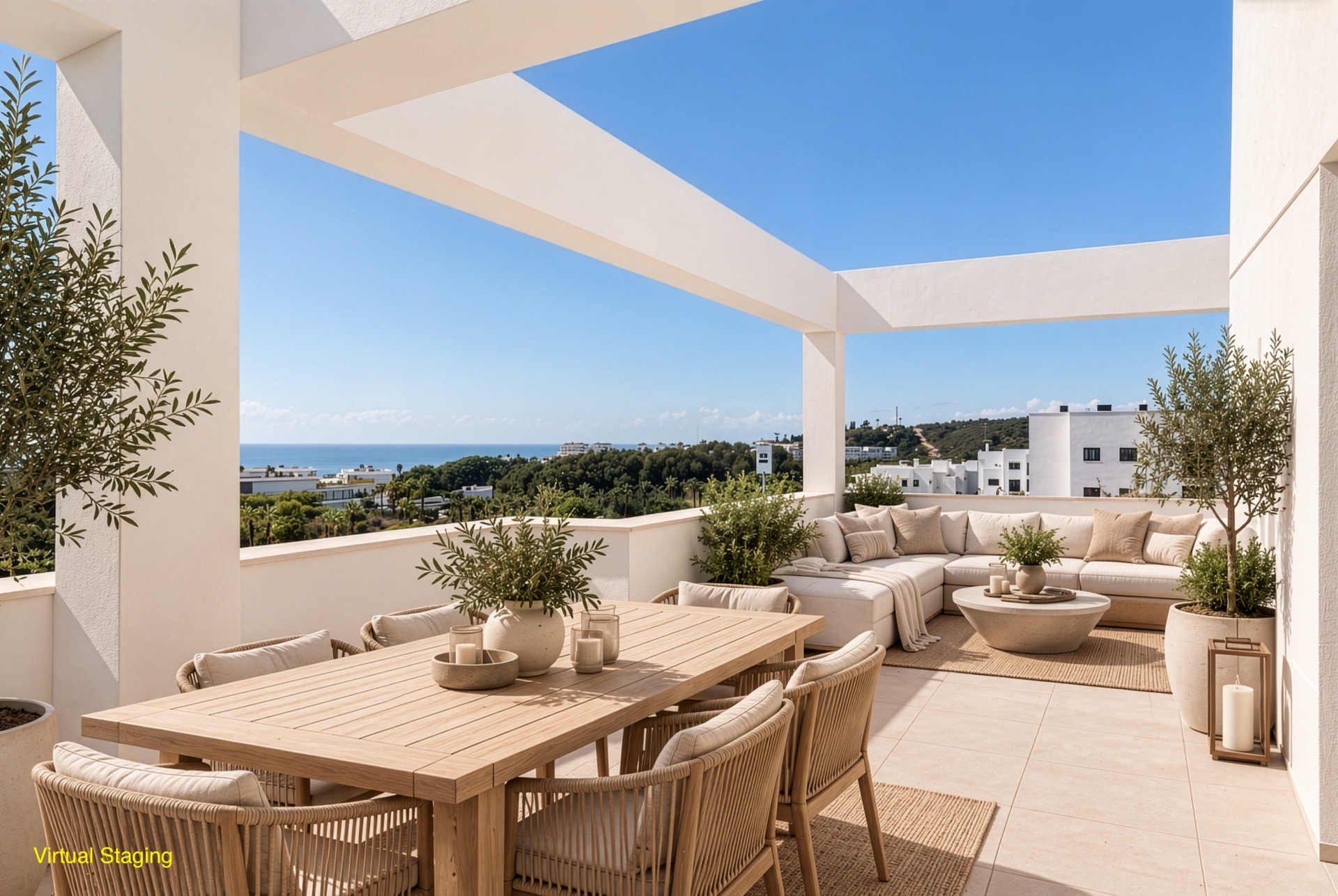 Covered terrace with dining and lounge seating and panoramic sea views